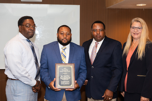 Wellington Byas, Victor Byas II, and Byas insurance representative W. T. McCormick, representing Victor and Grace Byas and Byas Funeral Homes